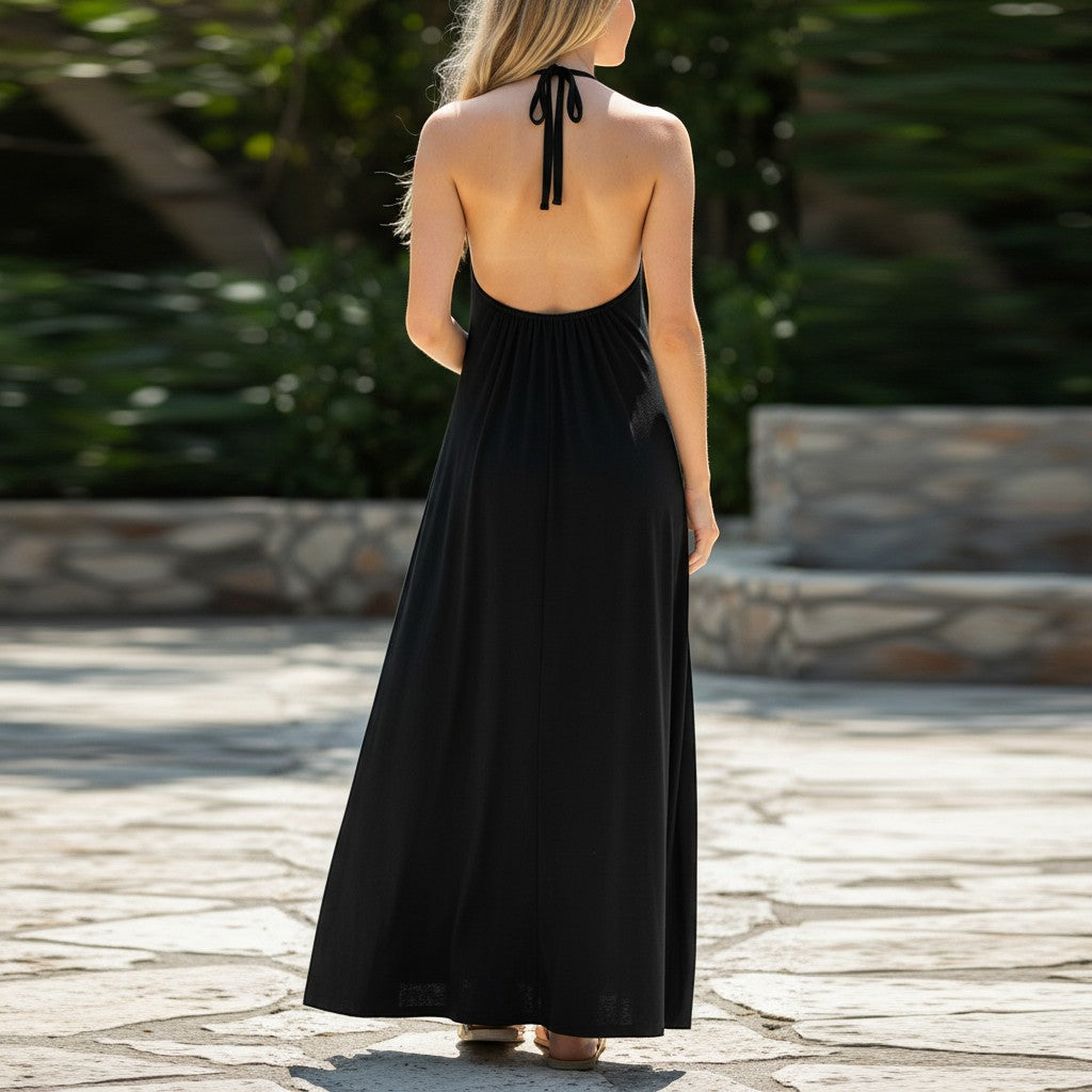 Chic Collective black halter neck maxi dress with a flowing skirt, perfect for versatile styling.