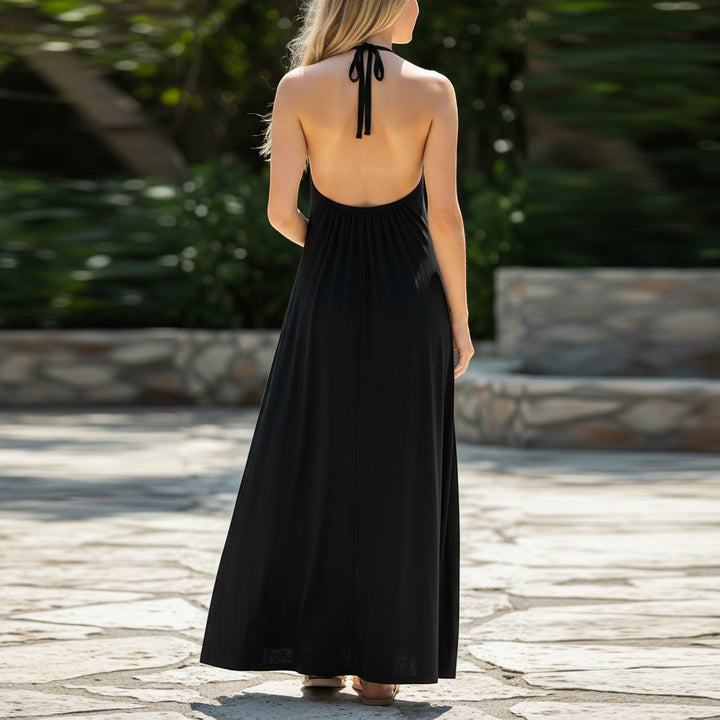 Chic Collective black halter neck maxi dress with a flowing skirt, perfect for versatile styling.