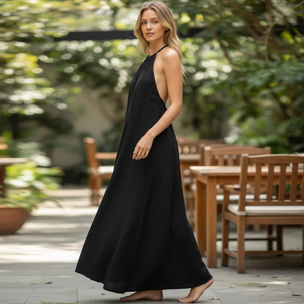 Chic Collective black halter neck maxi dress with a flowing A-line skirt, perfect for versatile styling.