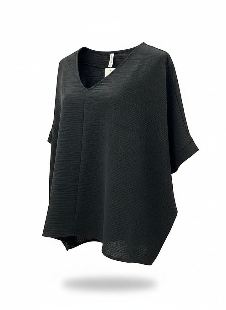 Chic Collective black textured V-neck dolman top with relaxed sleeves and a flattering silhouette.