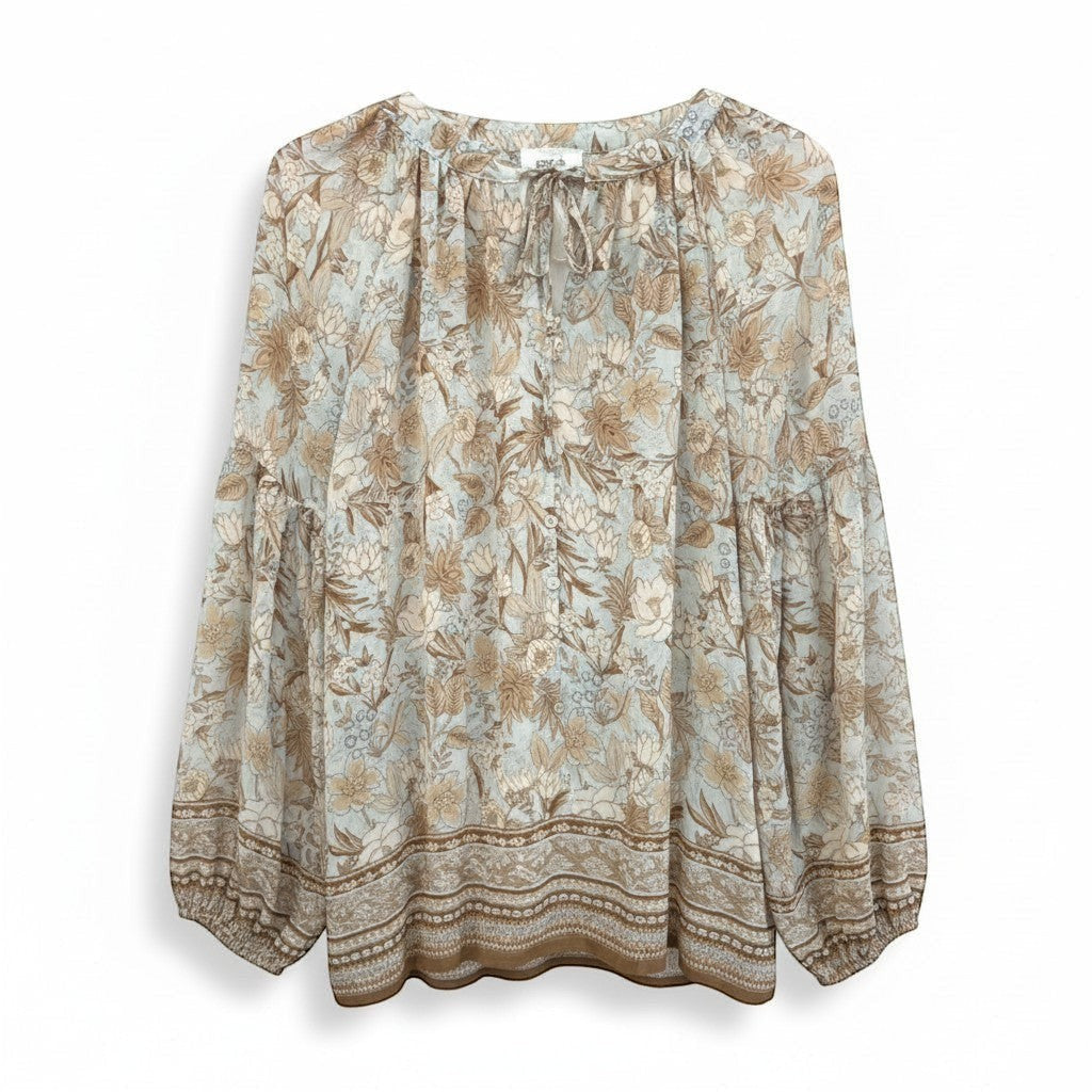 Chic Collective light blue floral print blouse with balloon sleeves and tie neck. Button front detail.