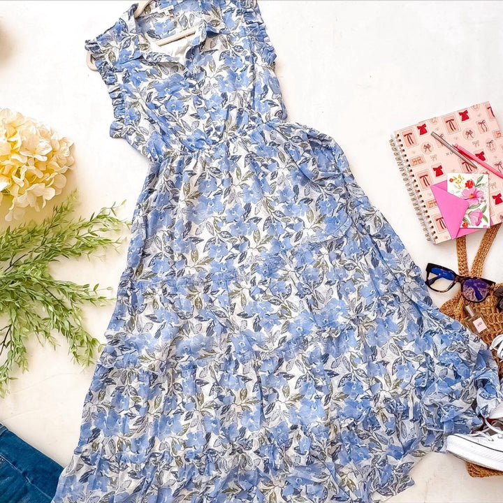 Chic Collective blue floral maxi dress with tiered ruffles and a collared neckline. Lightweight, flowy silhouette.