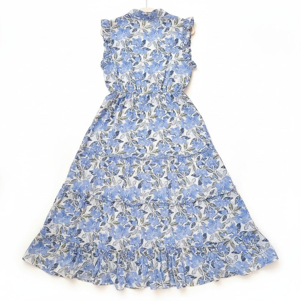 Chic Collective blue floral maxi dress with ruffled neckline and tiered skirt. Flowy silhouette, sleeveless design.