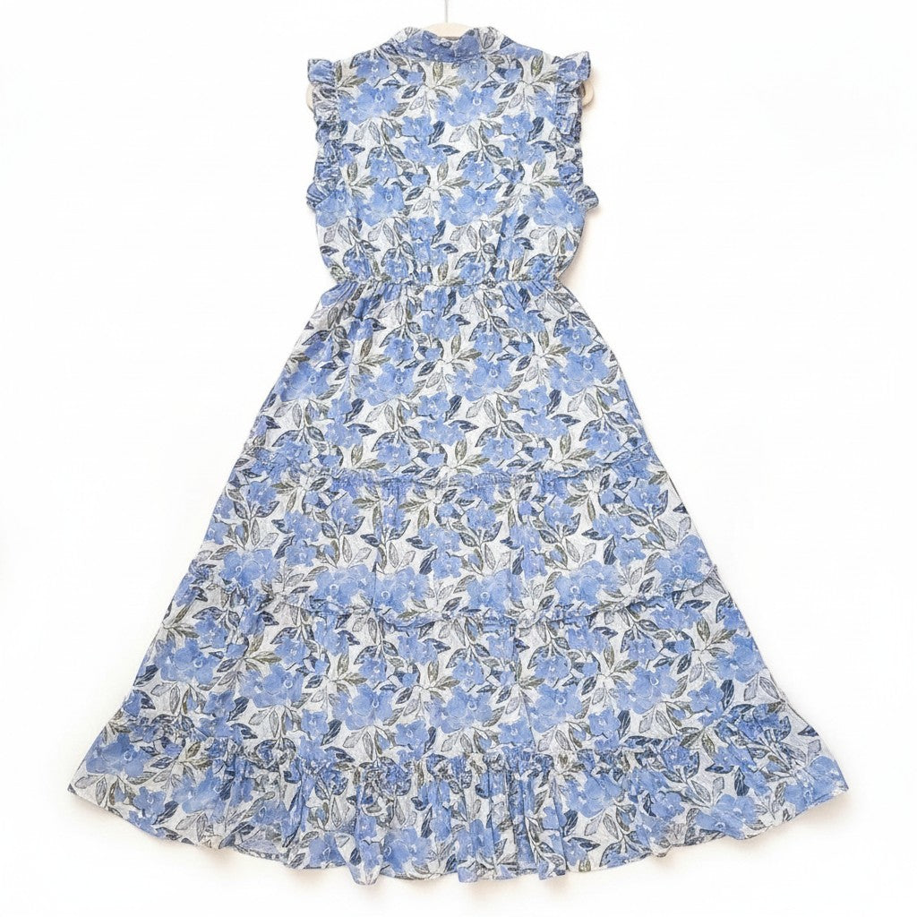 Chic Collective blue floral maxi dress with ruffled neckline and tiered skirt. Flowy silhouette, sleeveless design.