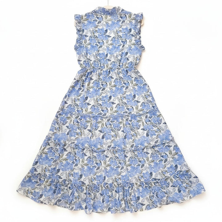 Chic Collective blue floral maxi dress with ruffled neckline and tiered skirt. Flowy silhouette, sleeveless design.