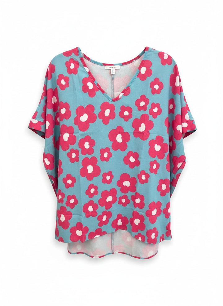 Chic Collective blue V-neck top with pink and white floral print, short sleeves, and relaxed fit.