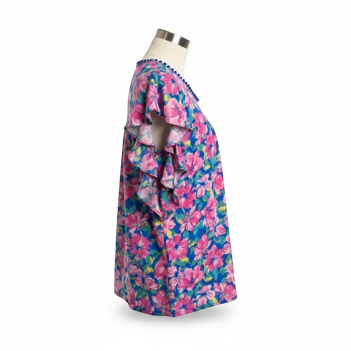 Chic Collective blue and pink hibiscus floral print ruffle top with beaded neckline and flutter sleeves.