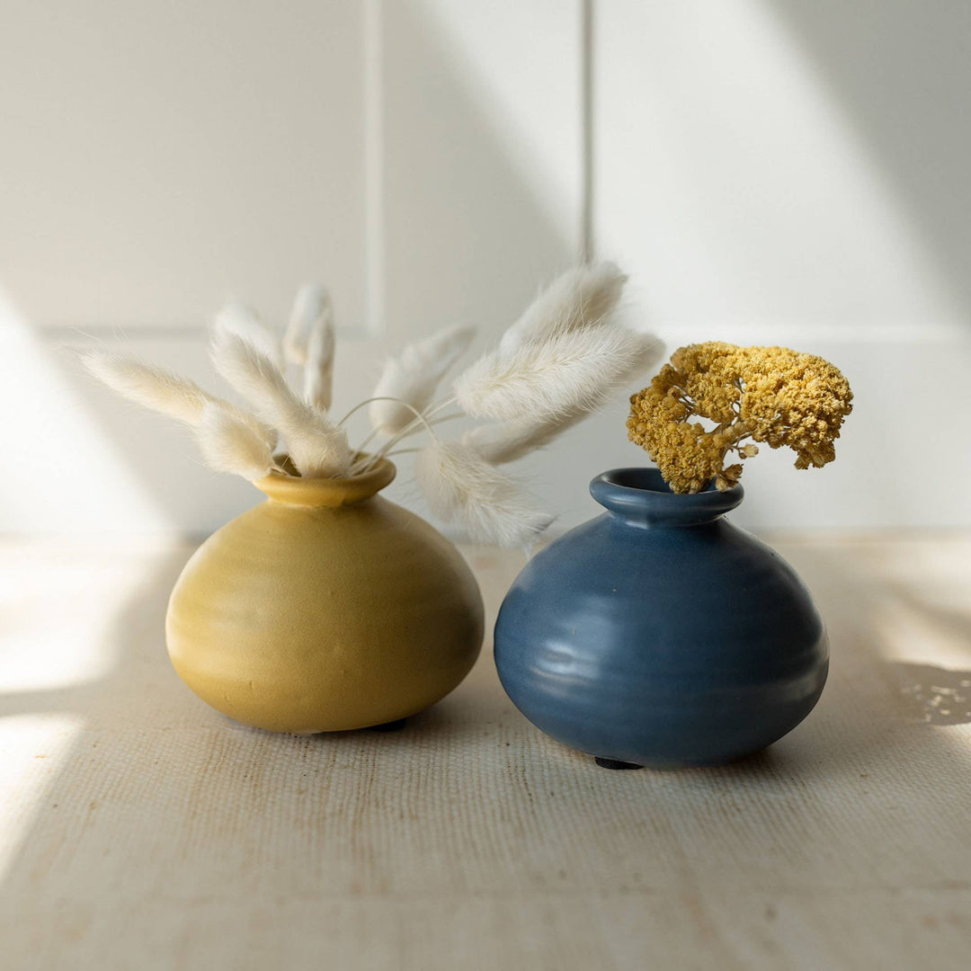 Chic Collective Mattie blue stoneware bud vase with ribbed texture, perfect for dried florals or single blooms.