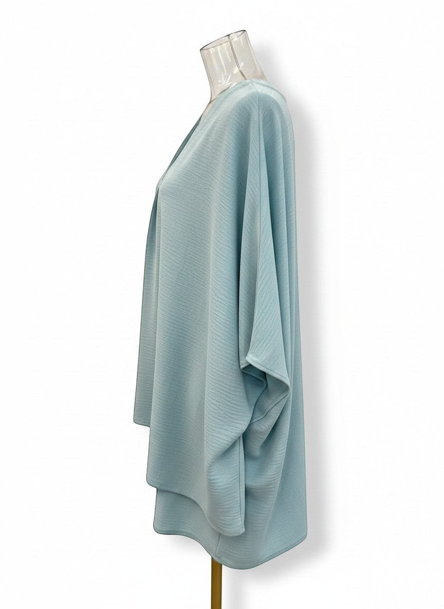 Chic Collective light blue textured V-neck dolman sleeve top. Lightweight, draped fabric with a relaxed fit.