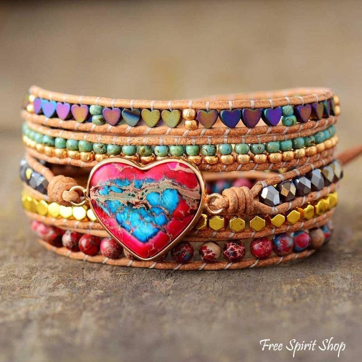 Chic Collective Bohemian Heart Charm Wrap Bracelet with genuine leather, natural stones, and metallic beads. Features a vibrant heart-shaped focal stone.