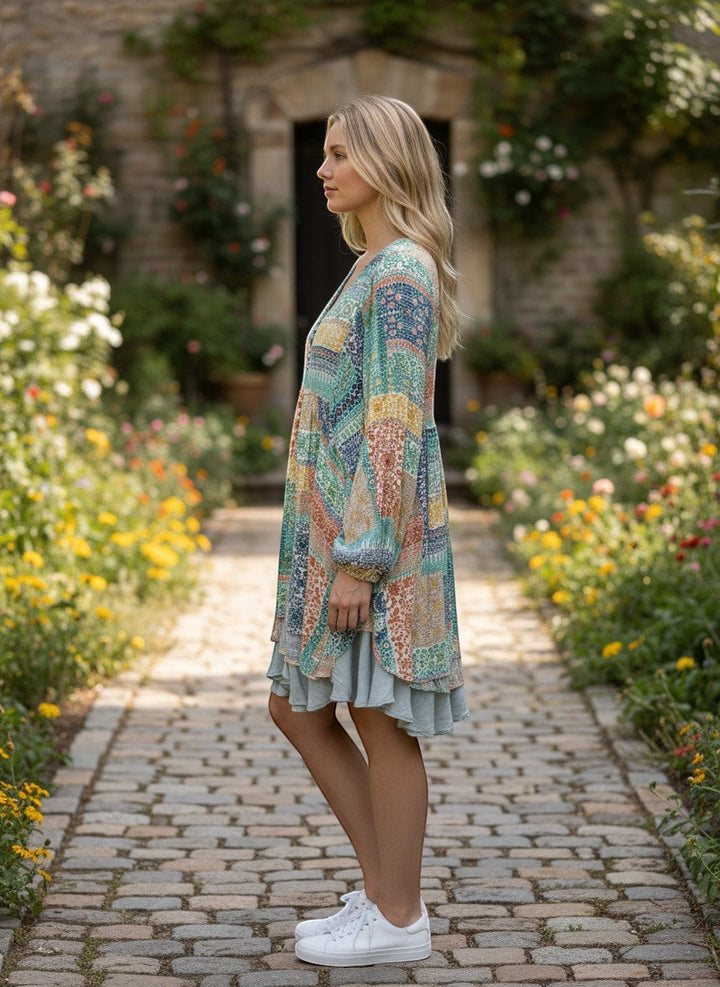 Chic Collective Bohemian patchwork V-neck top with mint and peach print, 3/4 sleeves, and tiered hem.