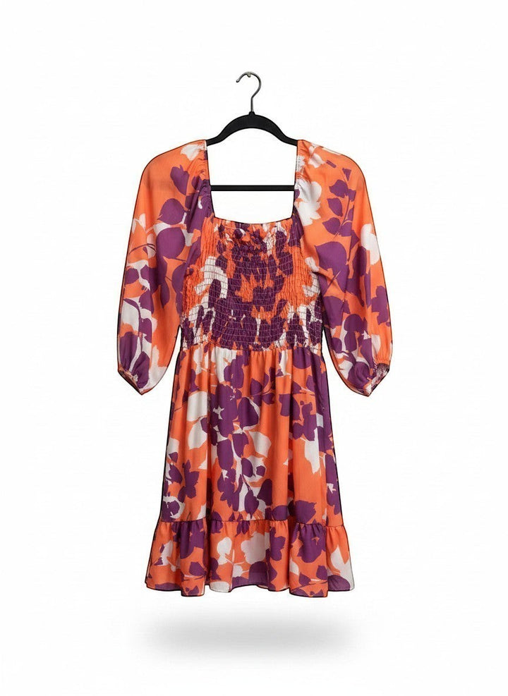 Chic Collective coral purple floral babydoll fit and flare dress with smocked bodice and tiered ruffle hem.