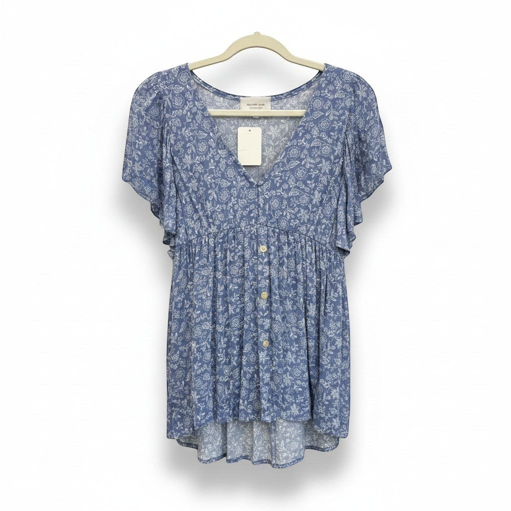 Chic Collective denim blue v-neck woven top with white floral print and flutter sleeves. Button front detail.