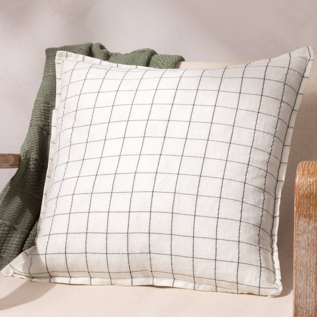 Chic Collective ecru 100% linen cushion with a yarn-dyed grid check pattern and flanged edge.