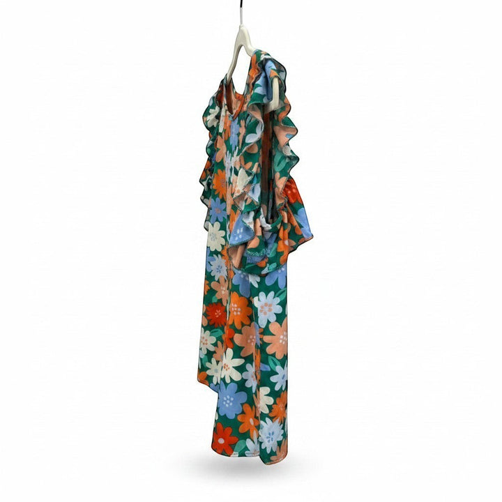 Chic Collective green, coral, and blue floral print flutter sleeve top. Lightweight fabric with a vibrant, playful design.