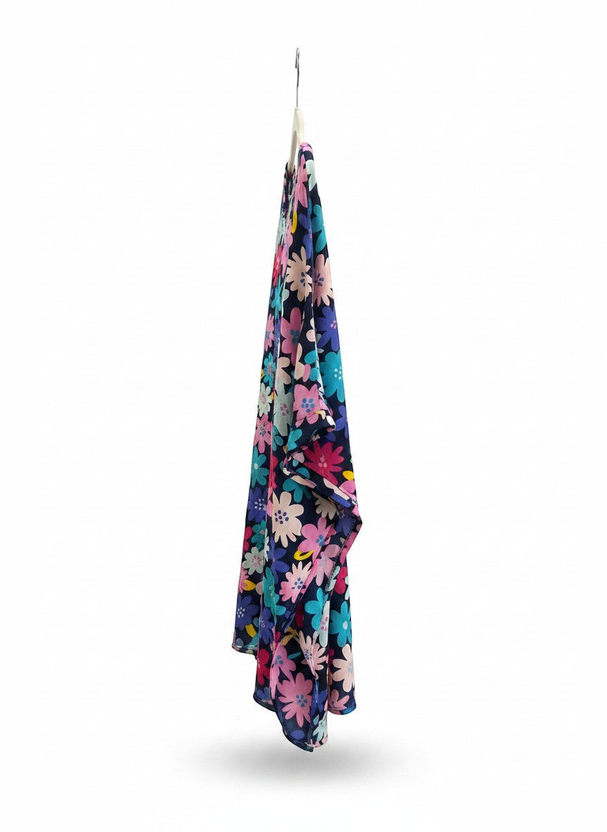 Chic Collective floral print V-neck kaftan top in navy with pink, blue, and teal flowers. Lightweight, flowy fabric.