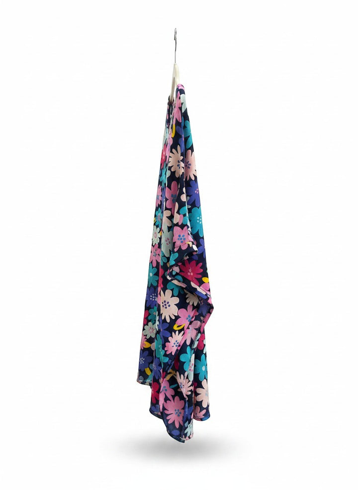 Chic Collective floral print V-neck kaftan top in navy with pink, blue, and teal flowers. Lightweight, flowy fabric.