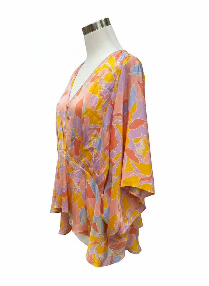 Chic Collective floral print peplum blouse with V-neck, kimono sleeves, and peach, yellow, lavender, sky blue colors.