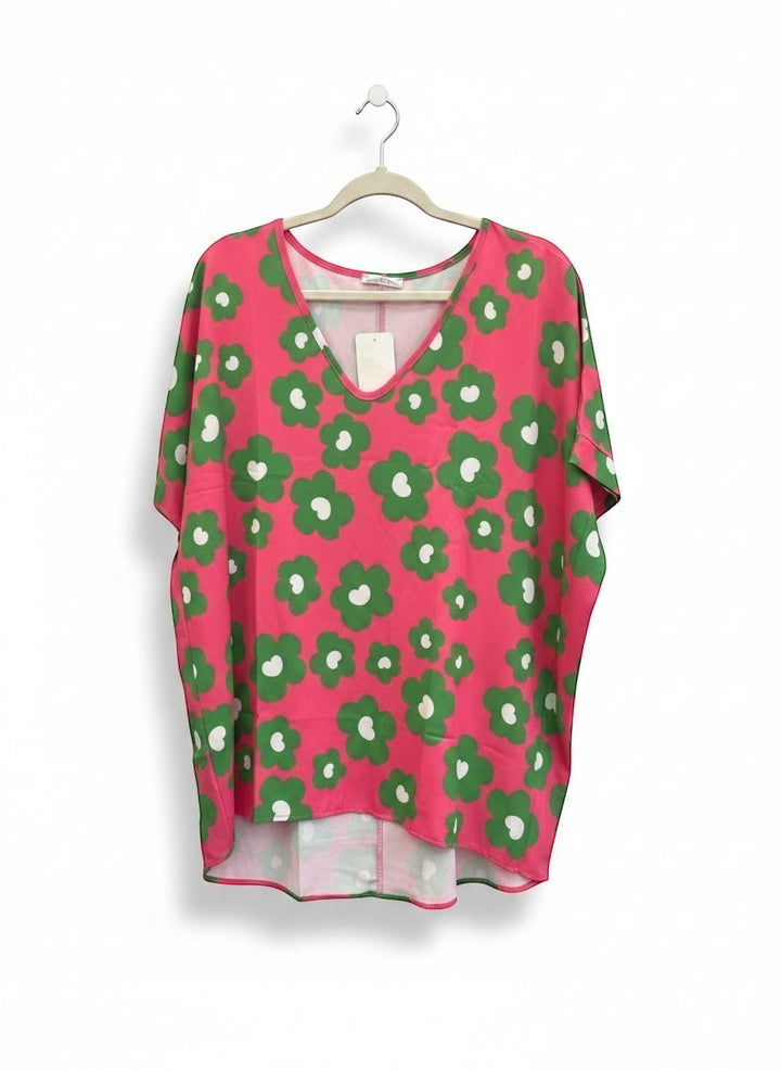 Chic Collective fuchsia green floral dolman top with a V-neck and short sleeves.