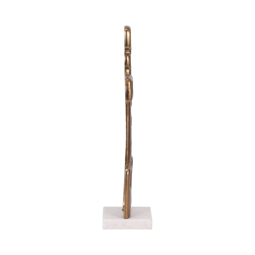 Chic Collective gold abstract metal sculpture with open rectangle design on a white marble base.