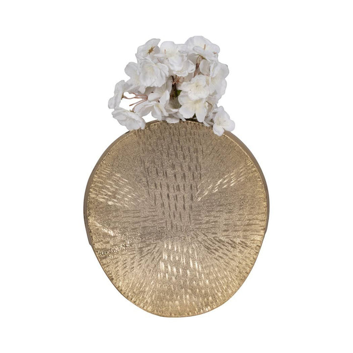Chic Collective 12-inch gold metal oval vase with etched texture and white flowers.