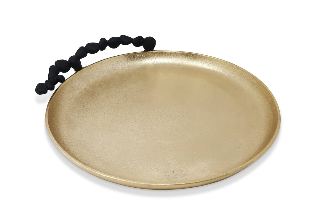 Chic Collective gold round tray with black pebble handles, ideal for serving or decor.