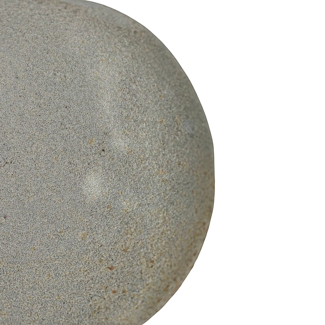 Chic Collective coastal gray textured terracotta deco ball with a sandy, stone-like finish.
