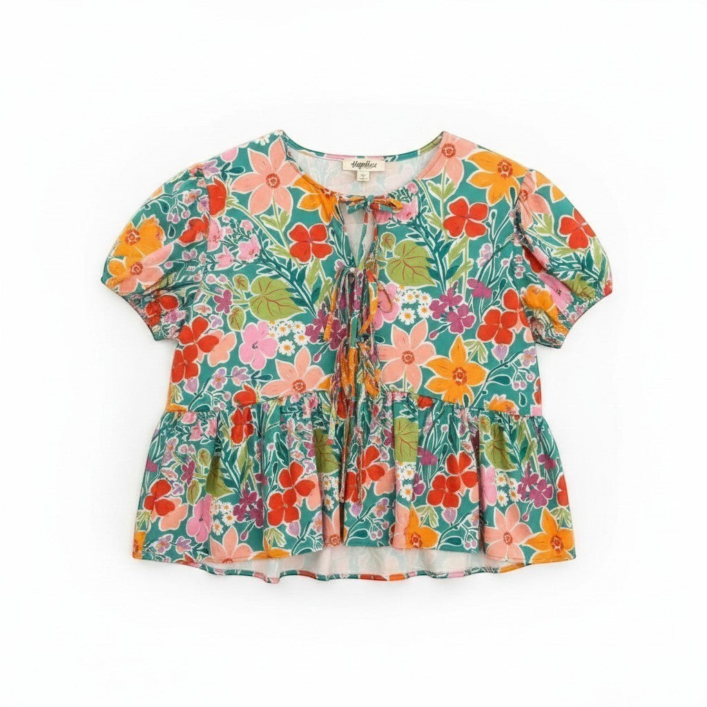 Chic Collective green floral print peplum blouse with short puff sleeves and a tie-neck ribbon bow. Lightweight woven fabric.