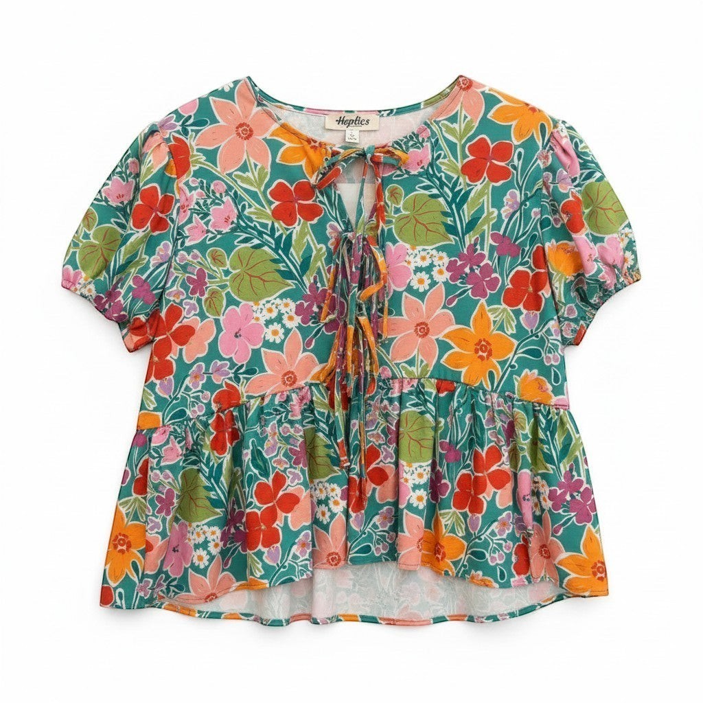 Chic Collective green floral print woven blouse with short sleeves and a tie-neck detail.