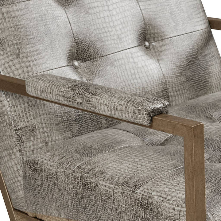 Chic Collective grey snakeskin PU leather accent chair with tufted back and antique bronze metal frame.