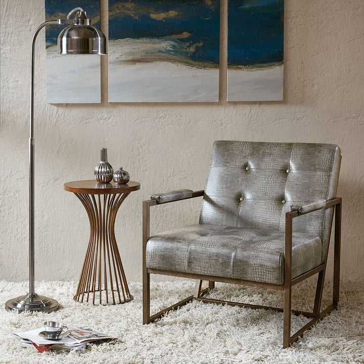 Chic Collective grey snakeskin PU leather accent chair with tufted back and antique bronze metal frame.