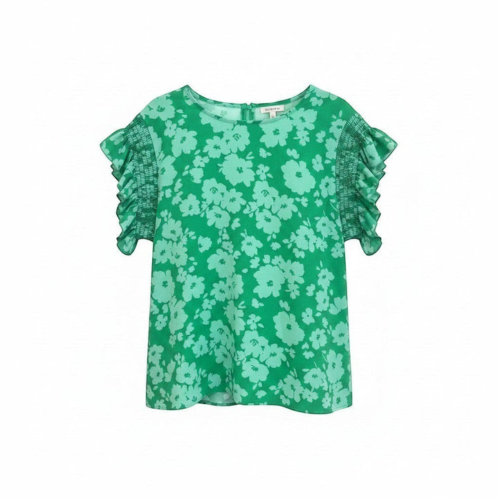 Chic Collective Kelly green woven blouse with a floral print, smocked short sleeves, and frilly cuffs.