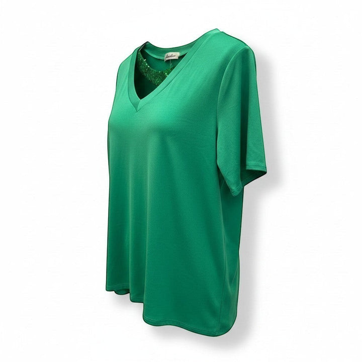 Chic Collective Kelly green asymmetrical top with V-neck and sequin detail. Short sleeves, flowing hem.