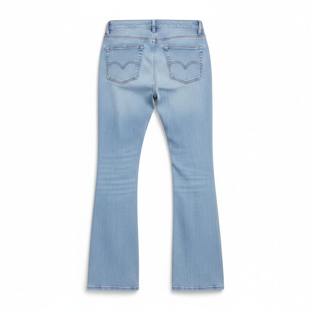 Chic Collective Risen Mid Rise Frayed Size 7 light wash denim flare jeans with classic back pockets.