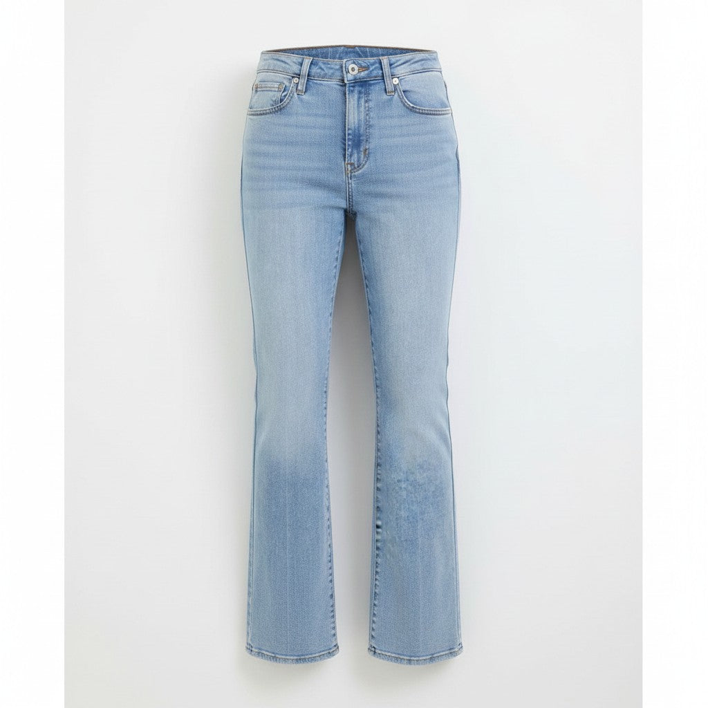 Chic Collective Risen Mid Rise Frayed light wash denim jeans with a slight flare and raw hem.