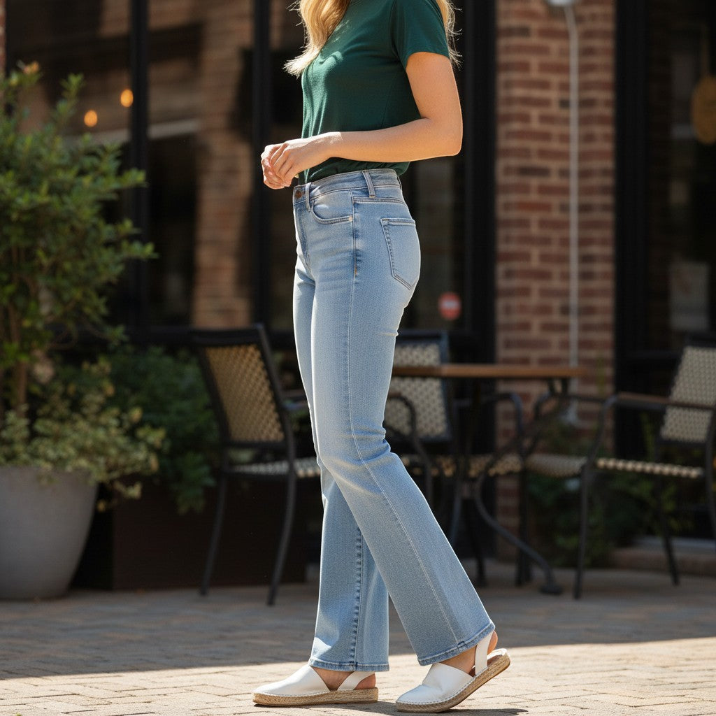 Chic Collective Risen Mid Rise light wash denim jeans with frayed hem, size 5.