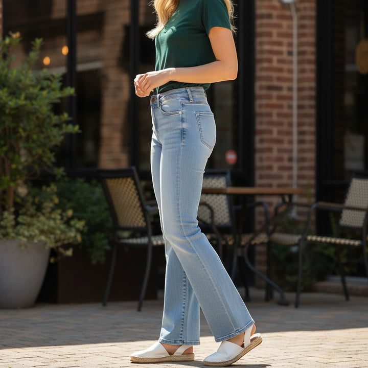 Chic Collective Risen Mid Rise light wash denim jeans with frayed hem, size 5.