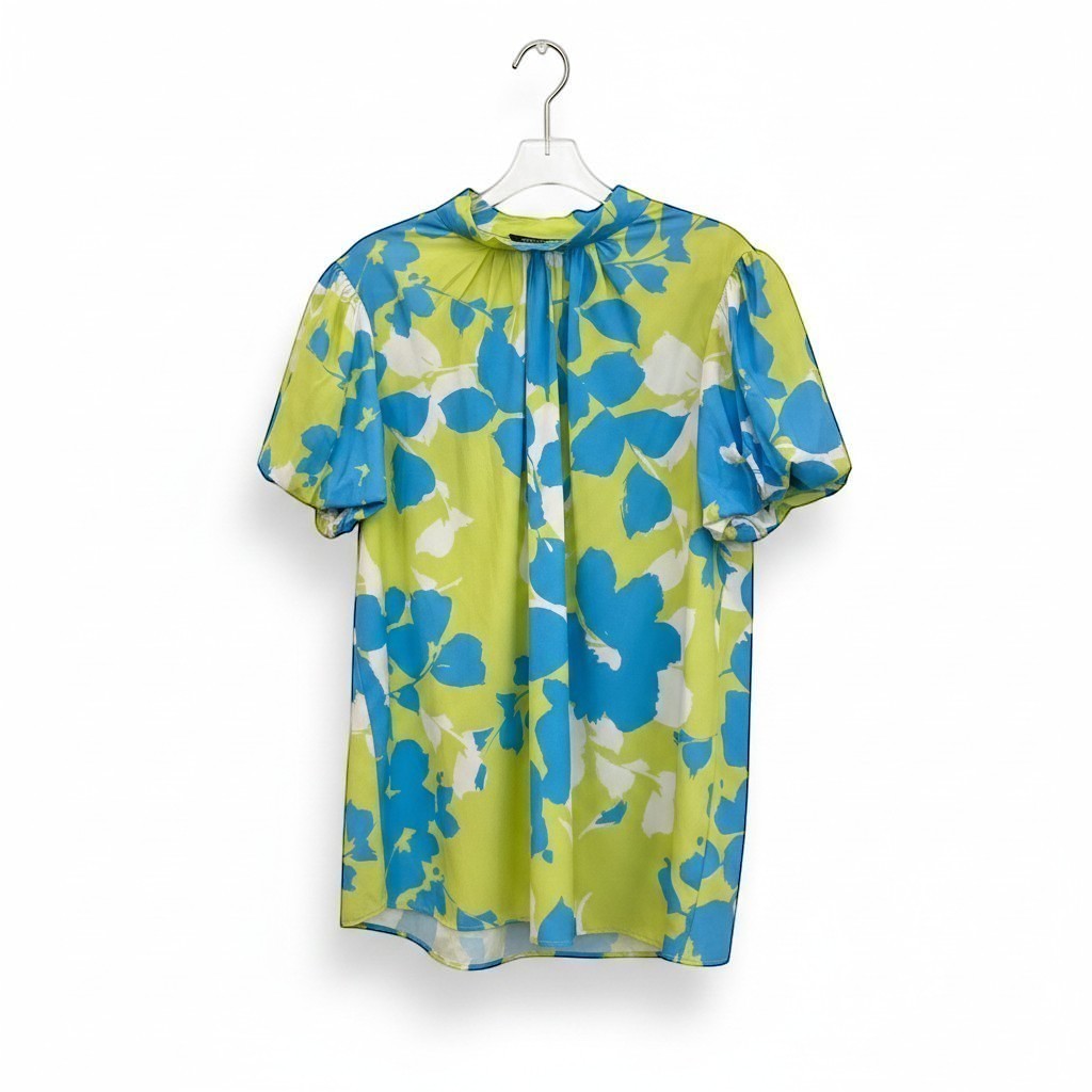 Chic Collective lime green and blue floral print short sleeve blouse with a high neckline and bow back detail.