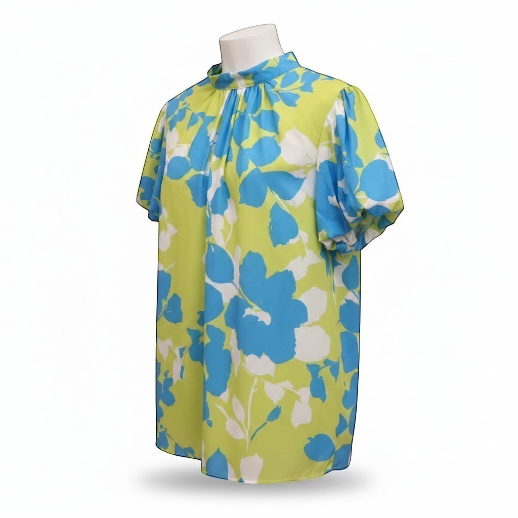 Chic Collective lime green and blue floral print blouse with short sleeves and a high neckline. Bow back detail.
