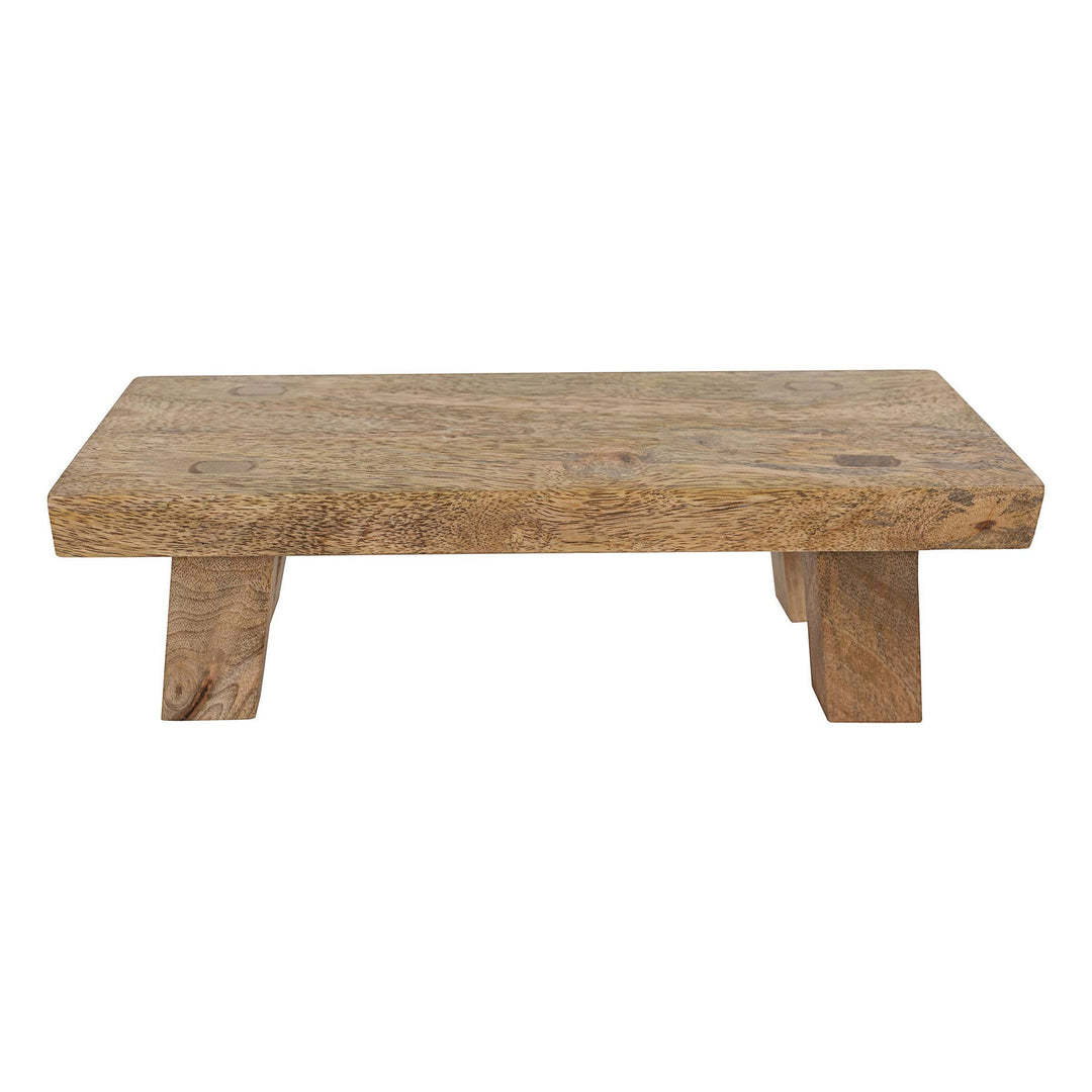 Chic Collective Hazel footed stool riser made of natural mango wood, perfect for serving or decor.