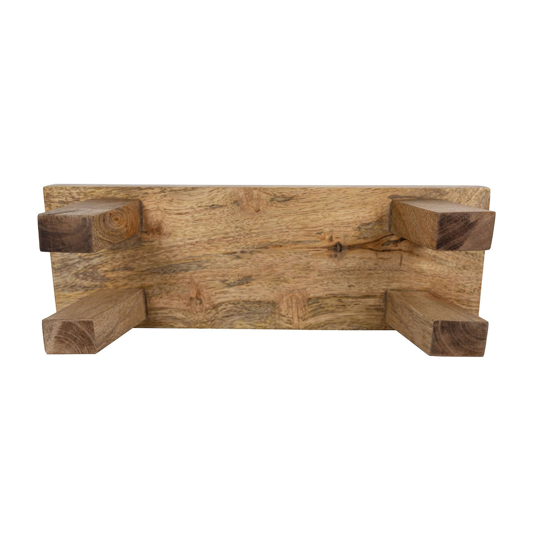 Chic Collective Hazel footed stool made of natural mango wood, perfect for farmhouse decor or serving treats.