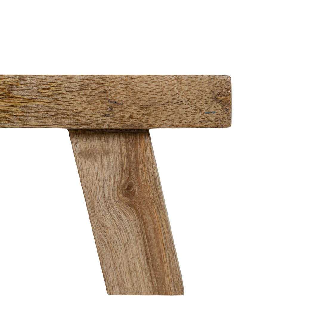Chic Collective Hazel footed stool riser made of natural mango wood with a rustic farmhouse style.
