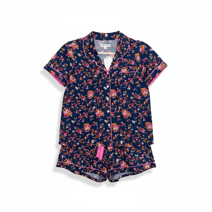 Chic Collective navy blue floral print short pajama set with pink trim and button-up top.