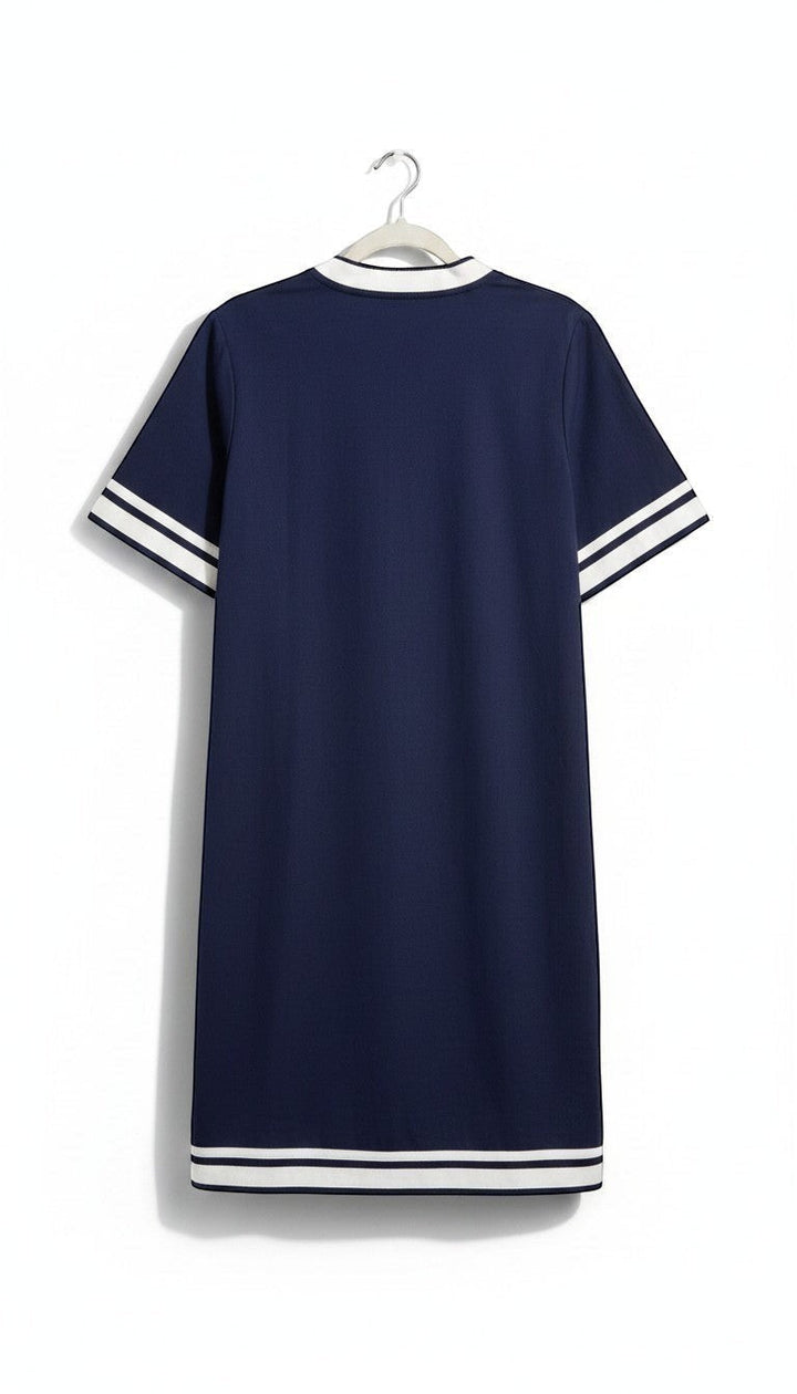 Chic Collective navy blue plus size tunic dress with white trim on V-neck, short sleeves, and hem.