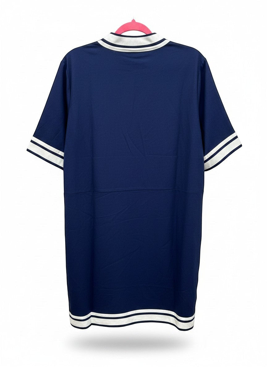 Chic Collective navy blue tunic dress with white trim on V-neck, sleeves, and hem. Relaxed fit, sporty style.