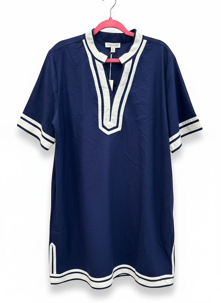 Chic Collective navy blue tunic dress with white trim on V-neck, sleeves, and hem. Relaxed fit, short sleeves.