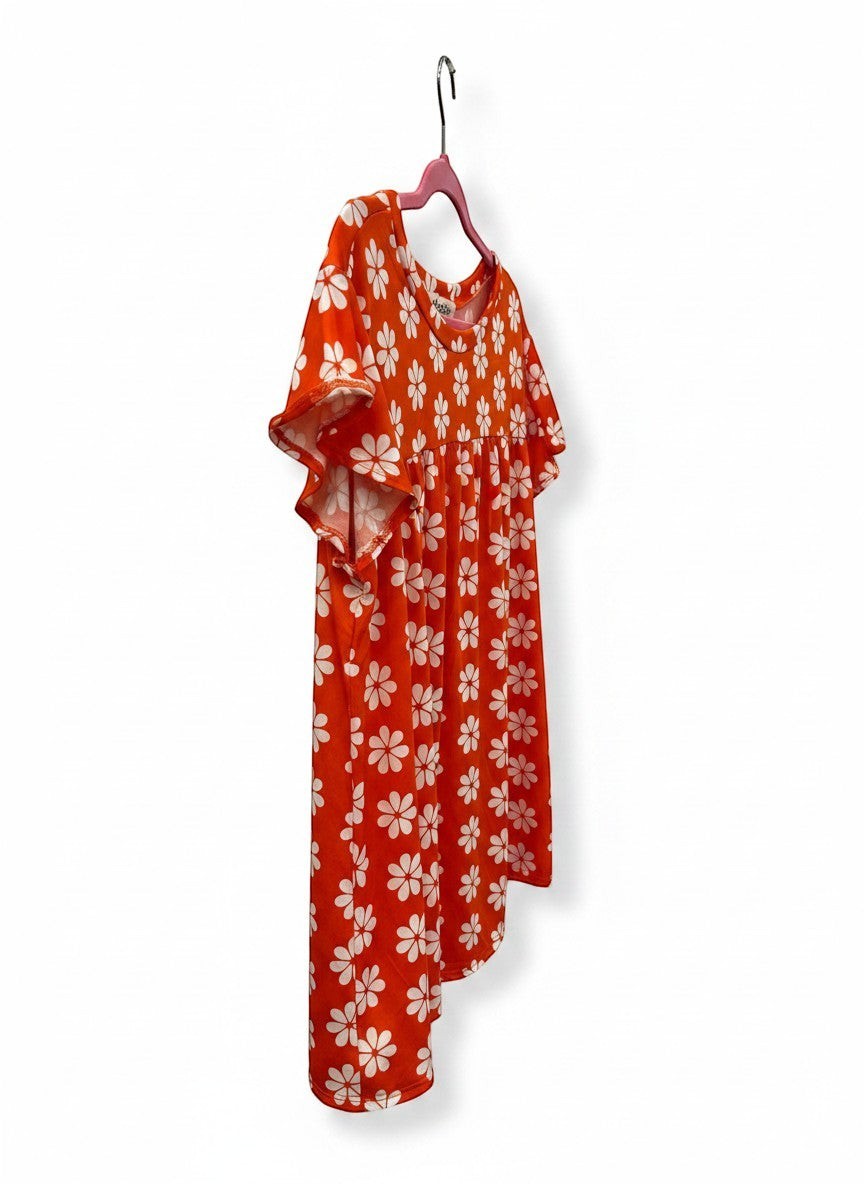 Chic Collective orange babydoll top with white daisy print and flutter sleeves. Soft, breathable fabric for casual wear.