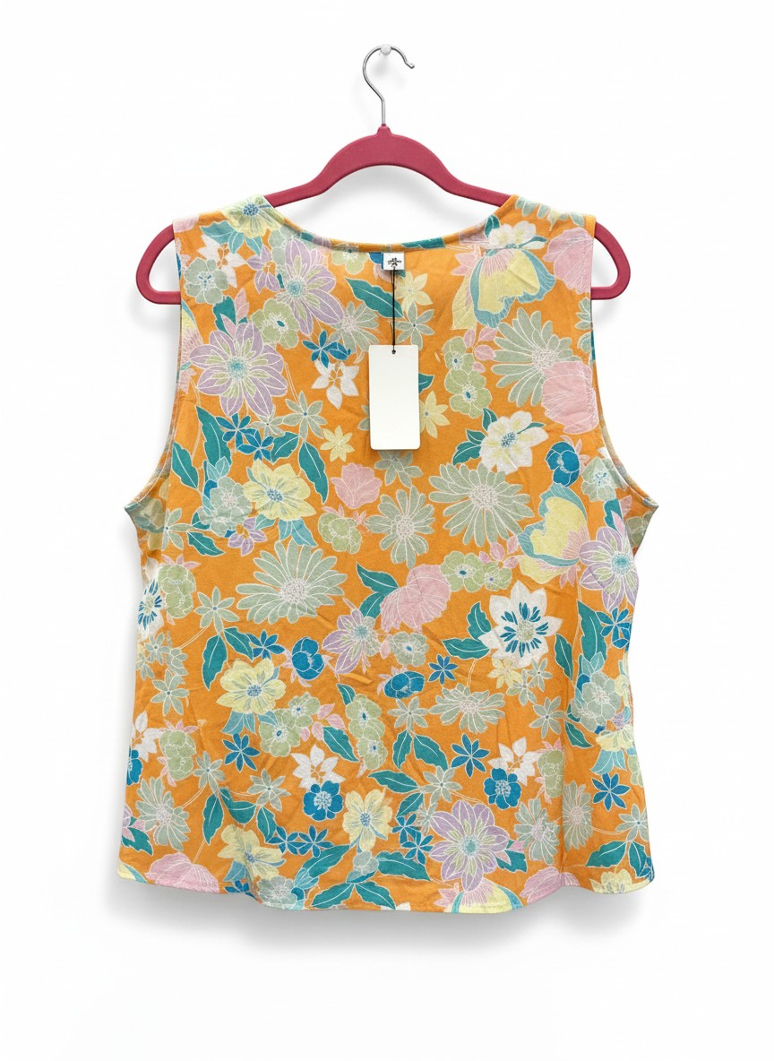 Chic Collective orange sleeveless V-neck top with a vibrant floral print in blue, pink, and yellow.