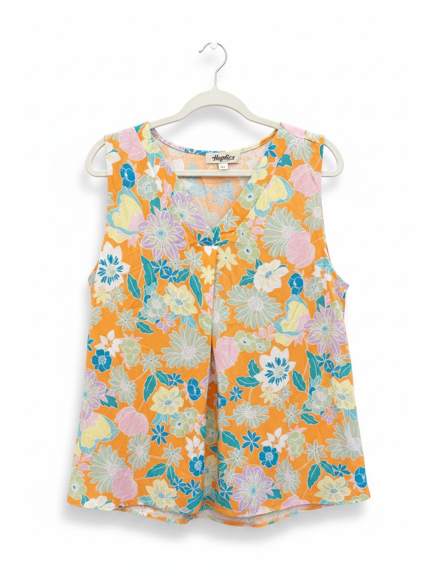Chic Collective orange sleeveless V-neck top with a vibrant floral print in blue, pink, yellow, and purple. Lightweight fabric.