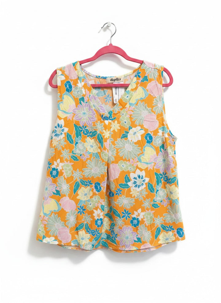 Chic Collective orange floral print sleeveless V-neck top with blue, pink, and yellow flowers. Lightweight fabric.